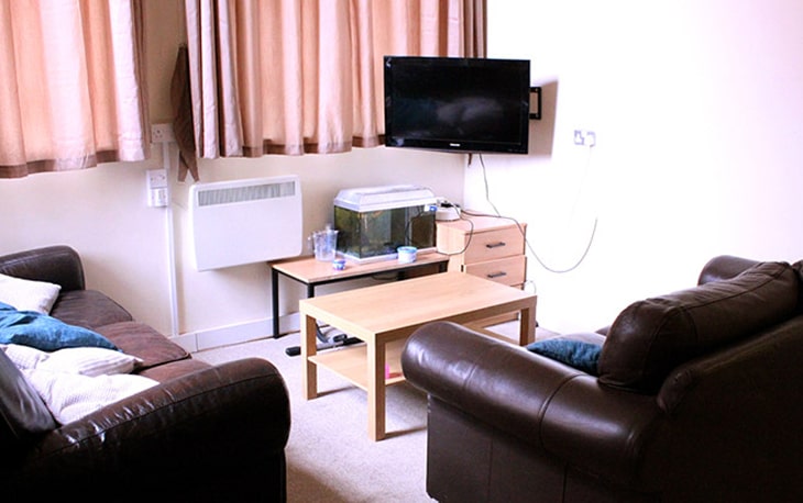 Tall building with ornate facade under blue sky